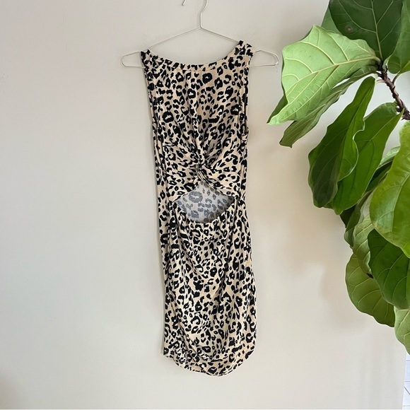 Dresses & Skirts - Cheetah Print Cut Out Stomach Midi Dress